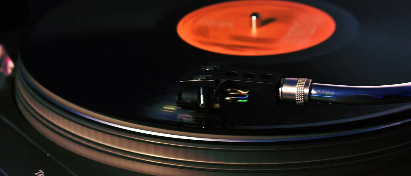 A vinyl record spinning on a turntable